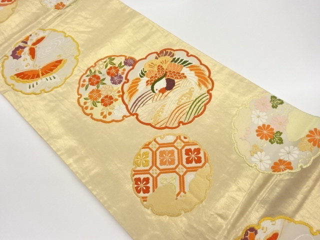 雪輪に鴛鴦・蝶・桜・菊模様織出し袋帯